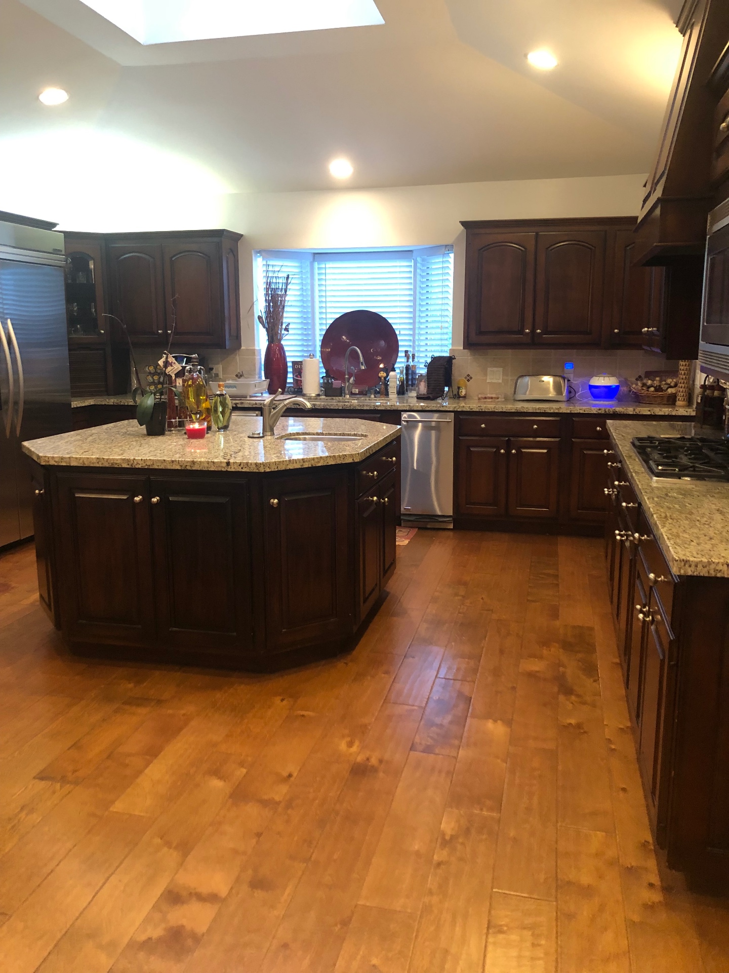 Encino kitchen with dark cherry cabinets before Venegas Construction remodel